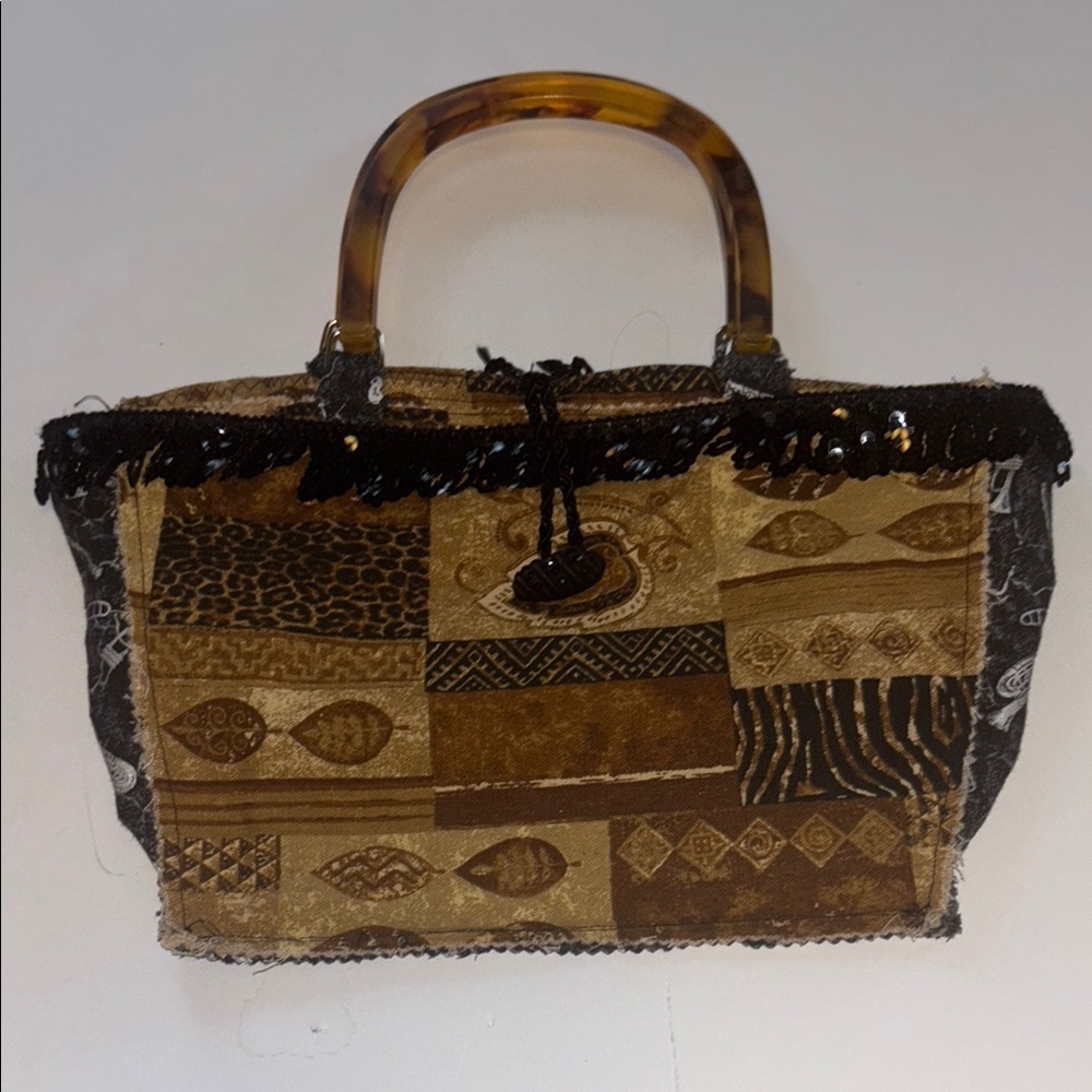 BROWN AND TAN BLACK LEAF DESIGN CLOTH MATERIAL WITH SEQUINS ACRYLIC HANDLES